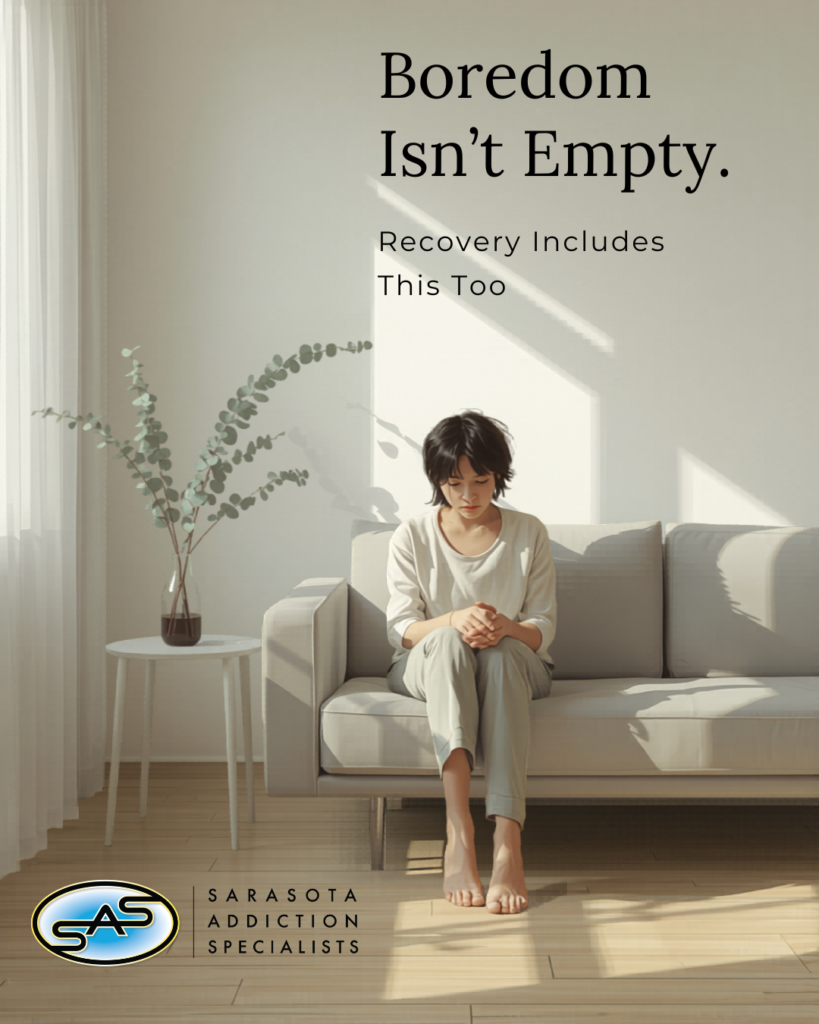 Person sitting quietly and appearing restless in a calm, minimal space